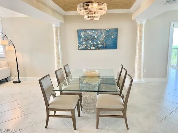 a view of a dining room with furniture