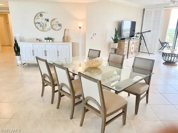 a view of a dining room with furniture