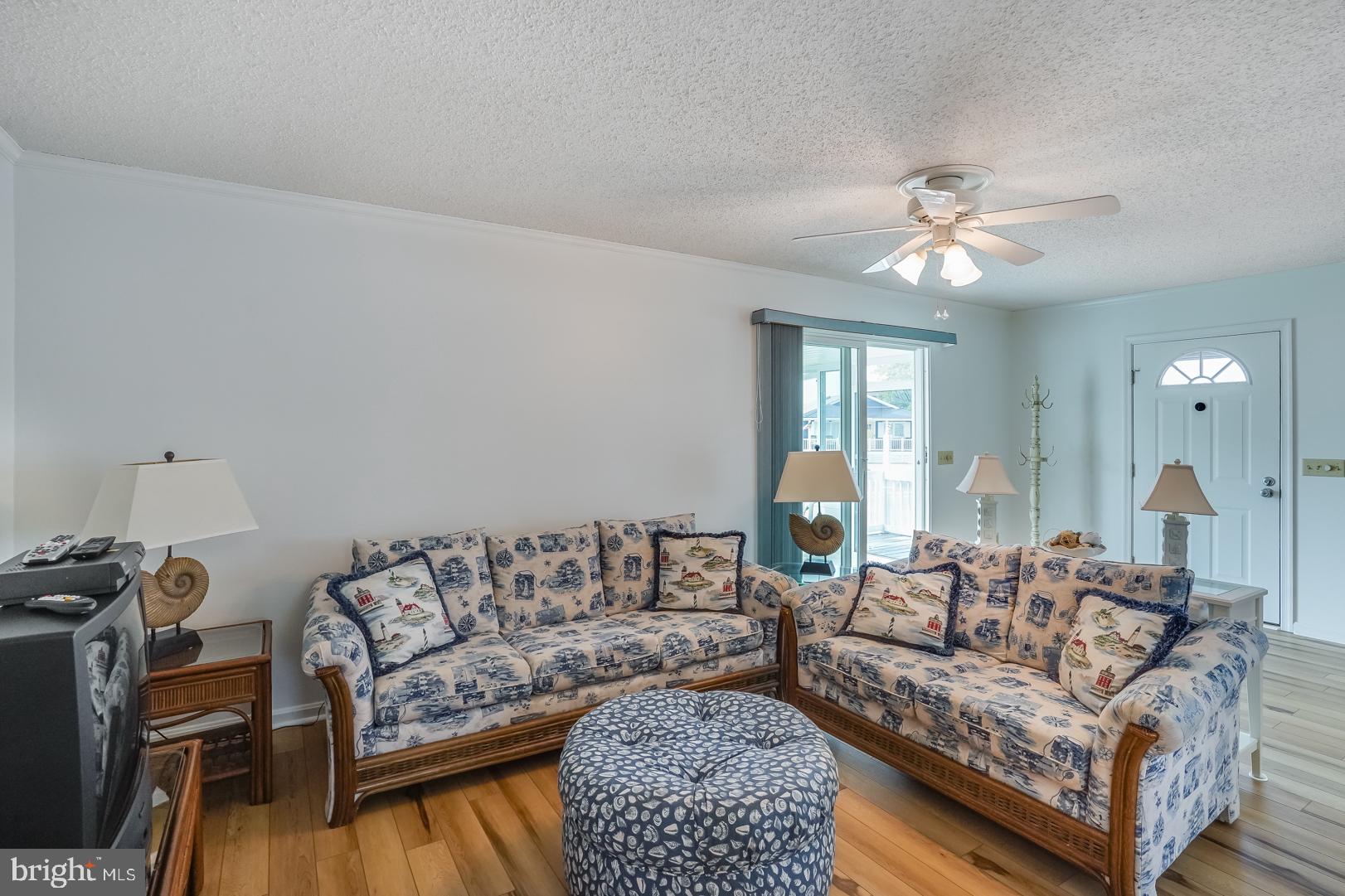 13702 Sailing Road Ocean City, MD 21842 - Photo 13 of 32 a living room with furniture and wooden floor