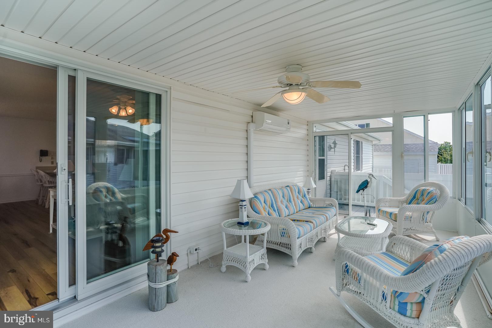 13702 Sailing Road Ocean City, MD 21842 - Photo 15 of 32 a living room with furniture