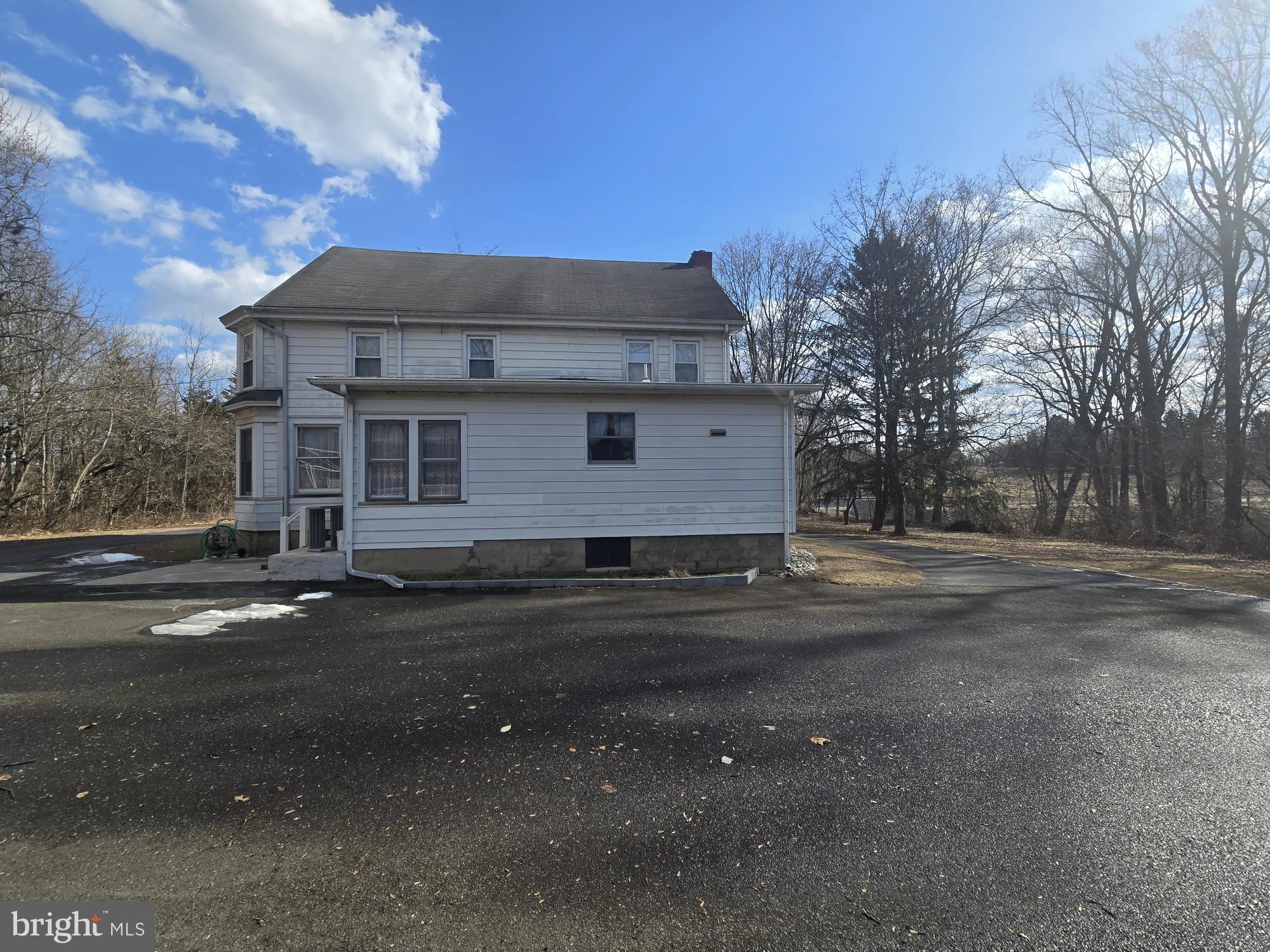 48 Garwin Road Swedesboro, NJ 08085 - Photo 6 of 7 a front view of a house with a yard
