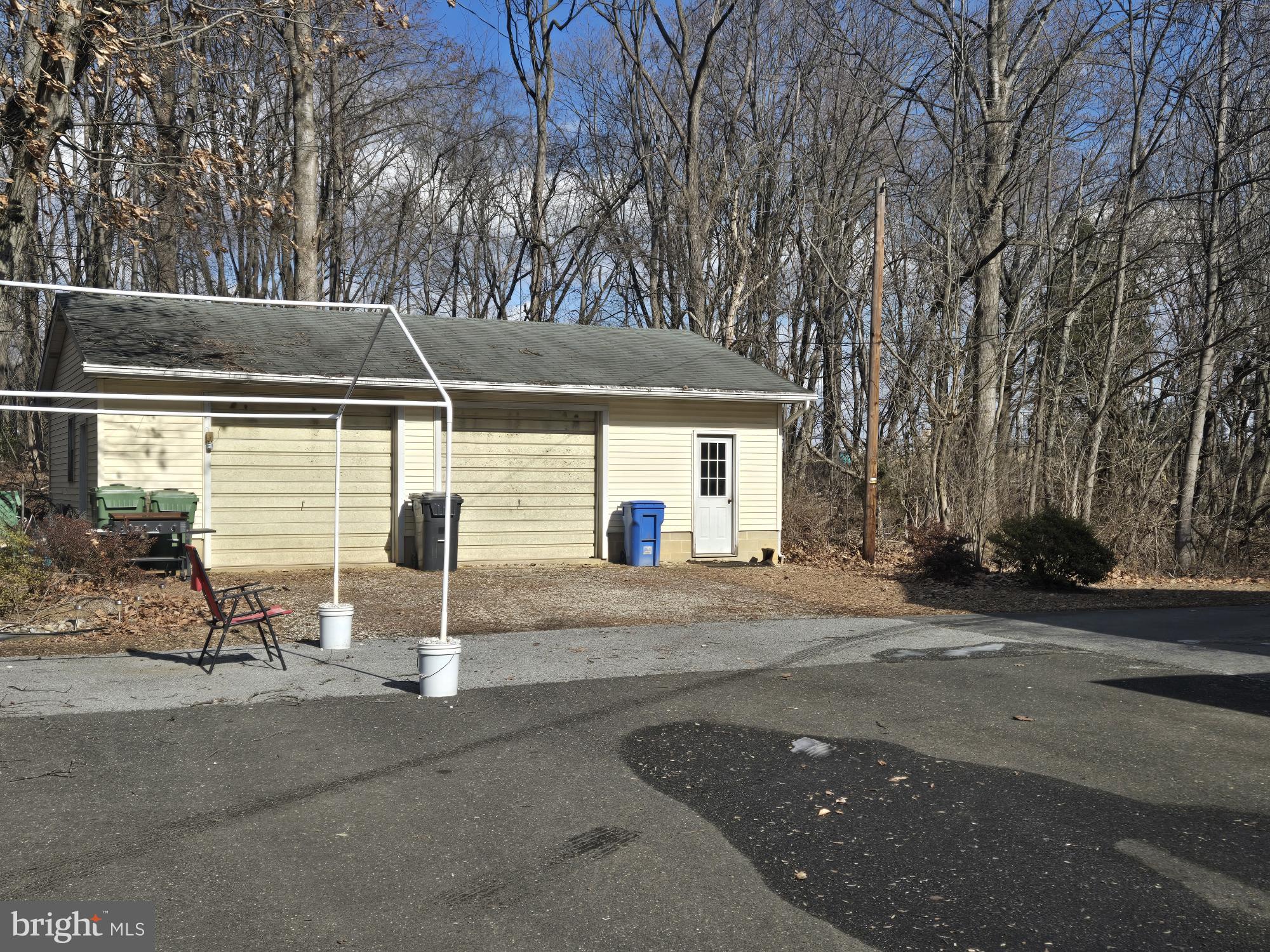 48 Garwin Road Swedesboro, NJ 08085 - Photo 7 of 7 a backyard of a house with table and chairs