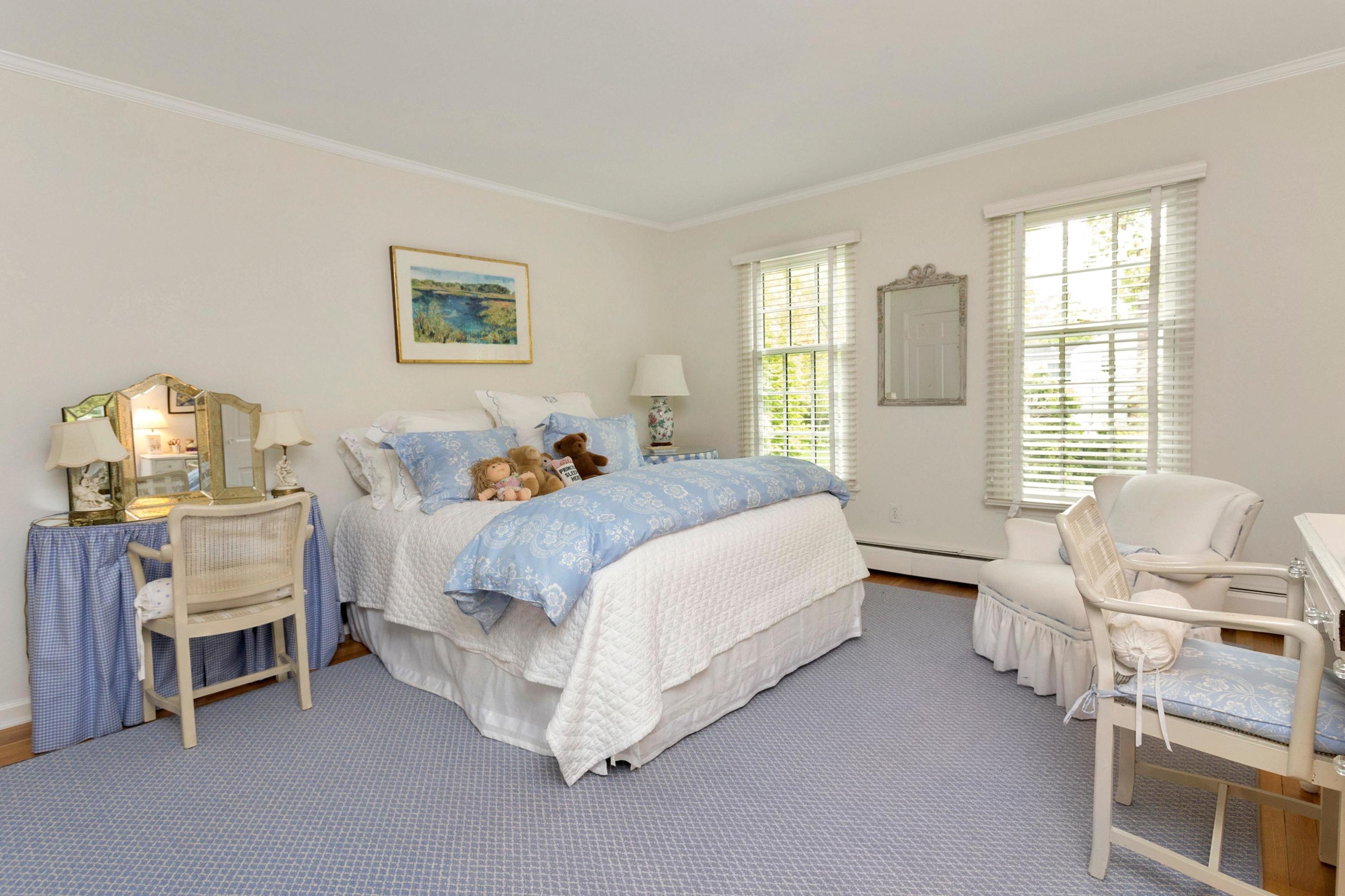 350 Middlesex Road Darien, CT 06820 - Photo 21 of 23 a spacious bedroom with a bed and a window