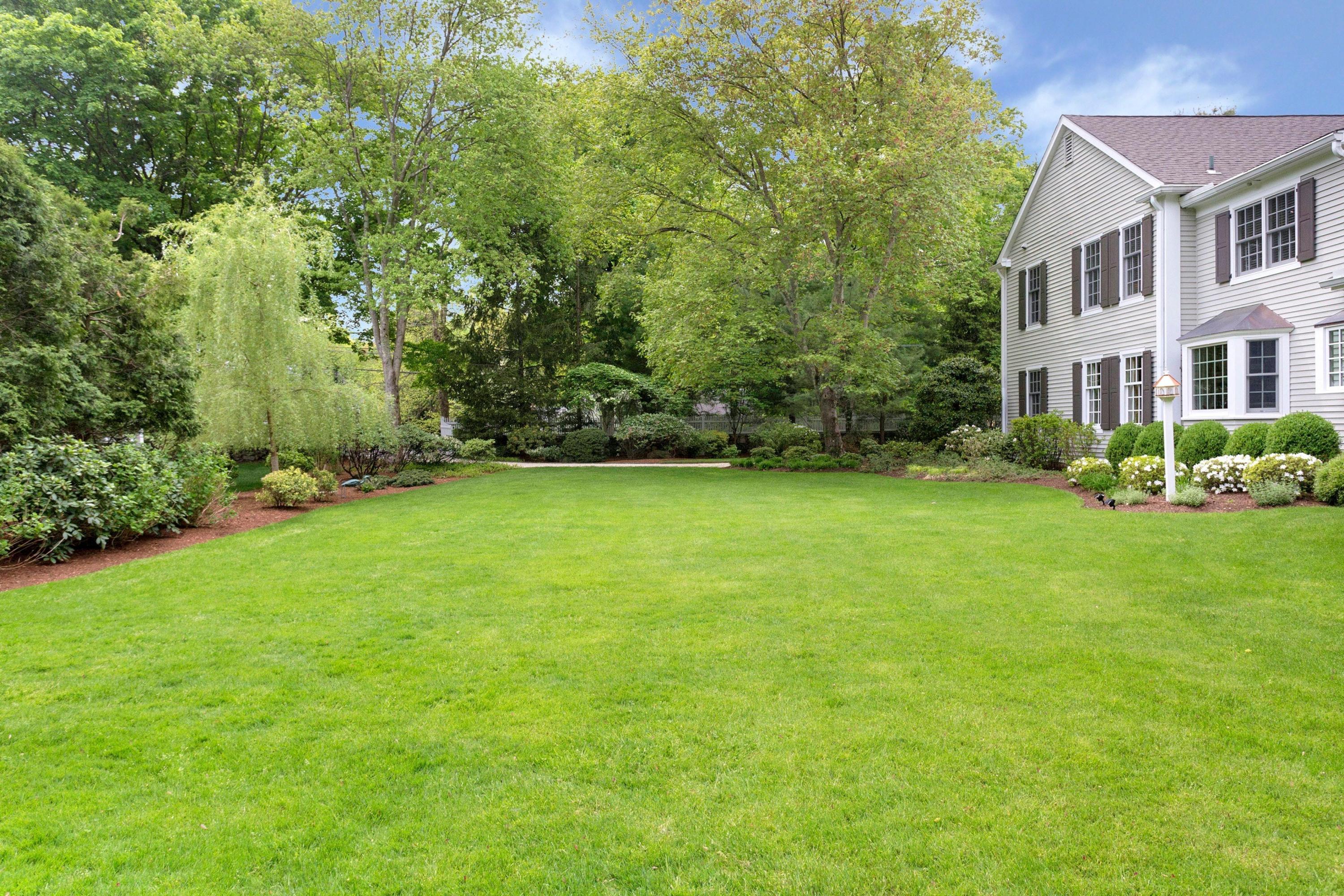 350 Middlesex Road Darien, CT 06820 - Photo 23 of 23 a view of a house with a garden