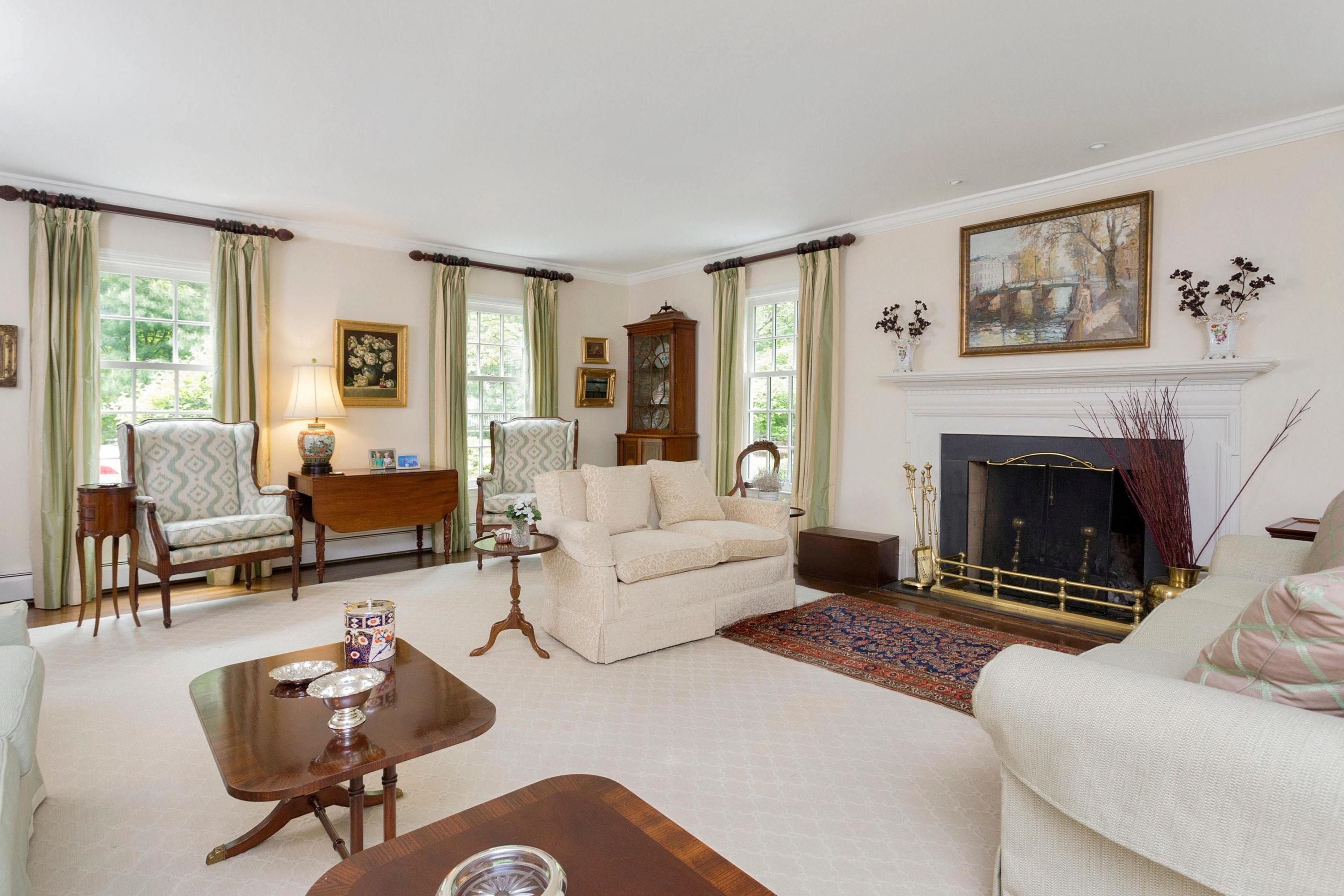 350 Middlesex Road Darien, CT 06820 - Photo 7 of 23 a living room with furniture and a fireplace