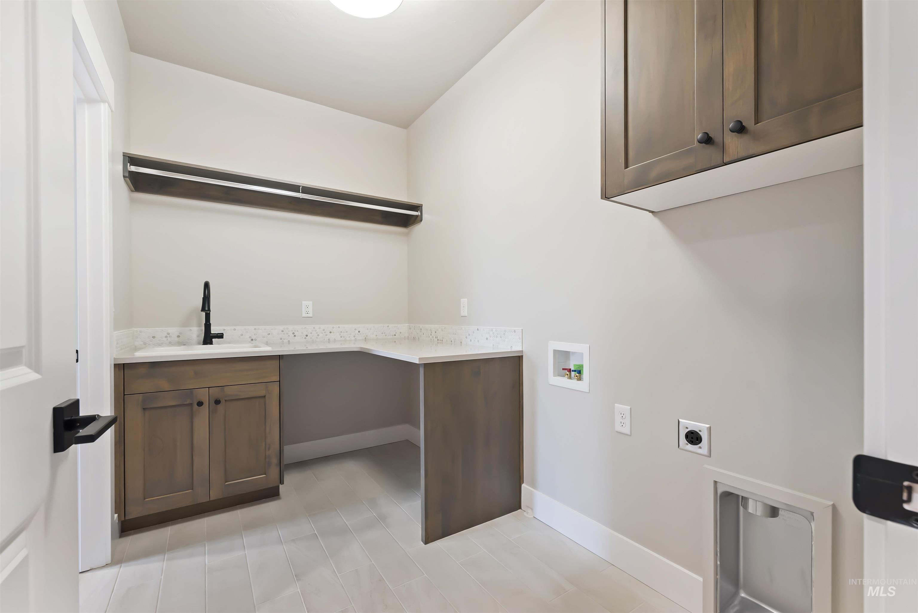7616 Brown Way Eagle, ID 83714 - Photo 11 of 21 Washroom with washer hookup, cabinet space, and electric dryer hookup