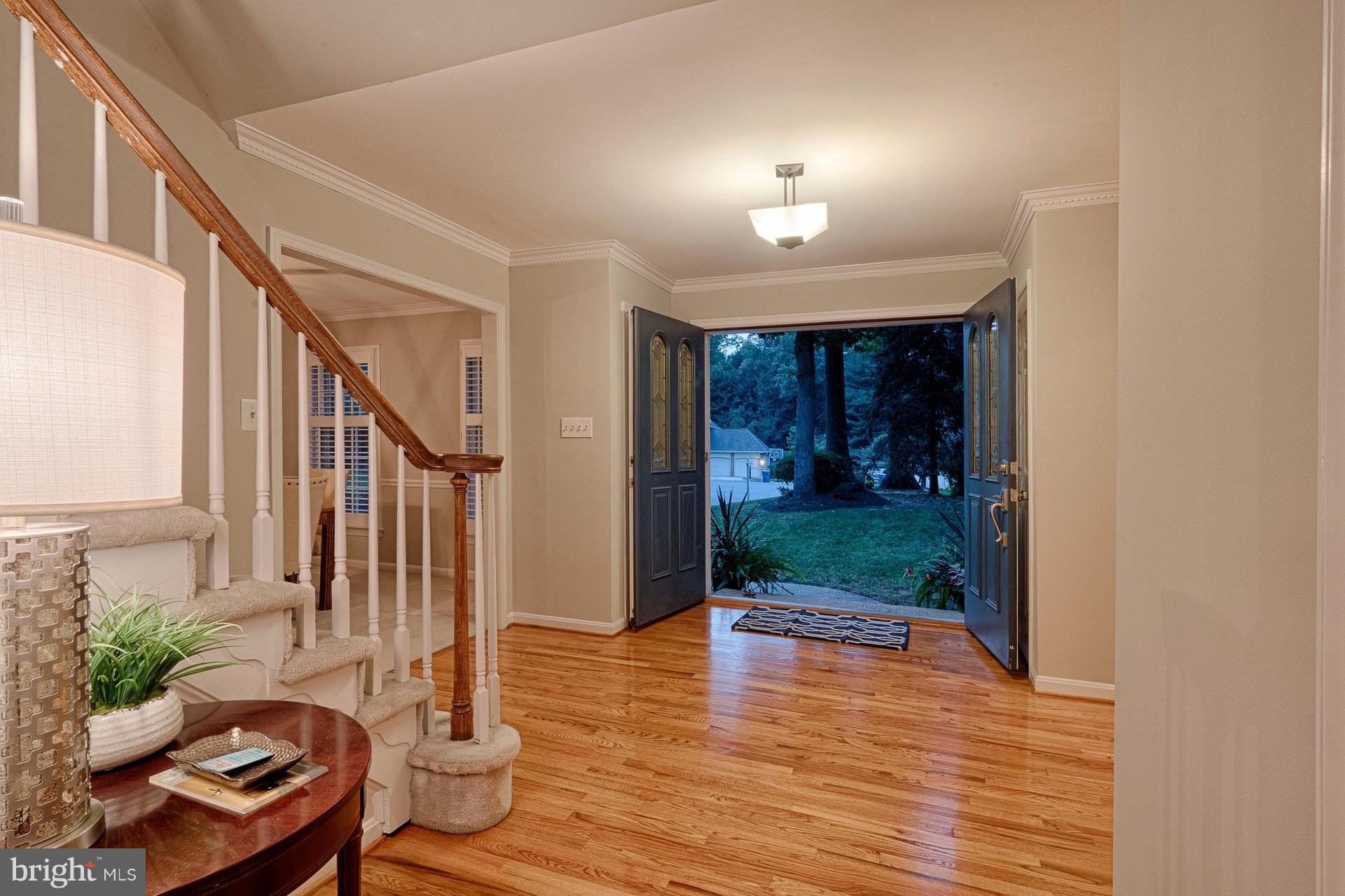 11869 Fawn Ridge Lane Reston, VA 20194 - Photo 2 of 30 Gorgeous entry! Gleaming wood, turned staircase,