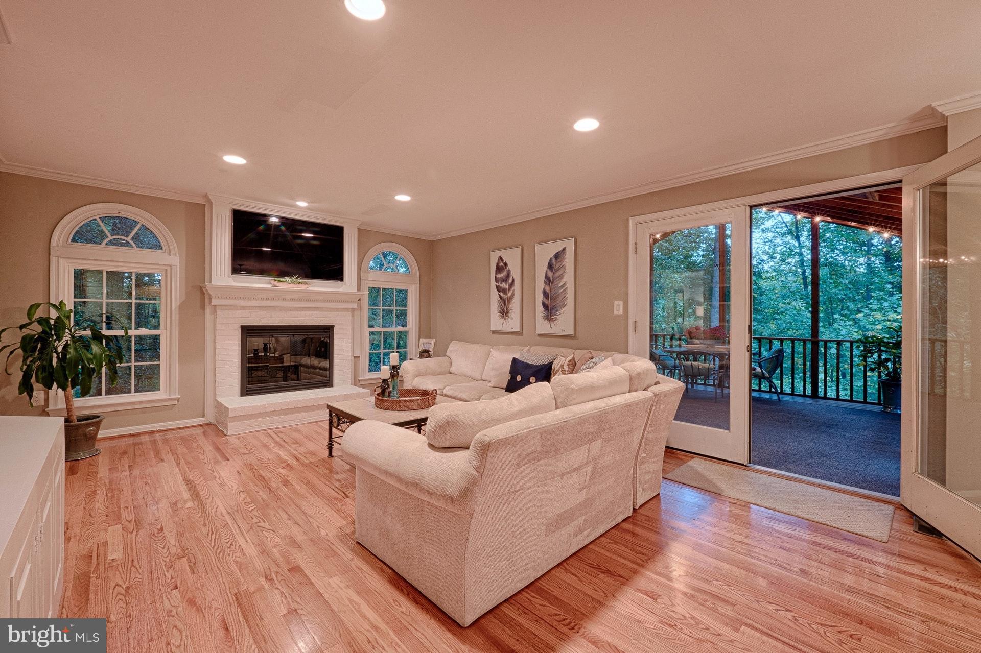 11869 Fawn Ridge Lane Reston, VA 20194 - Photo 5 of 30 Arched windows flank the fpl.