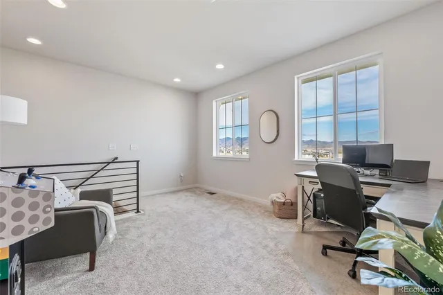 a bed room with a bed and a window