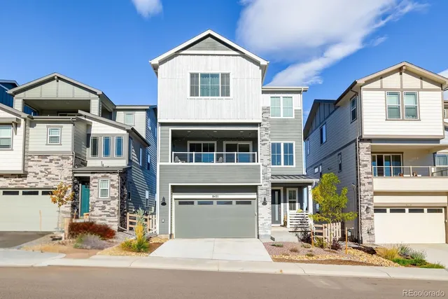 a patio with table and chairs