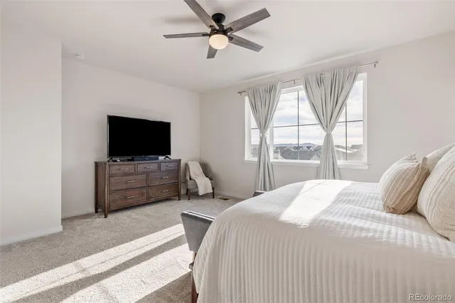 a bathroom with double vanity sink a mirror and shower