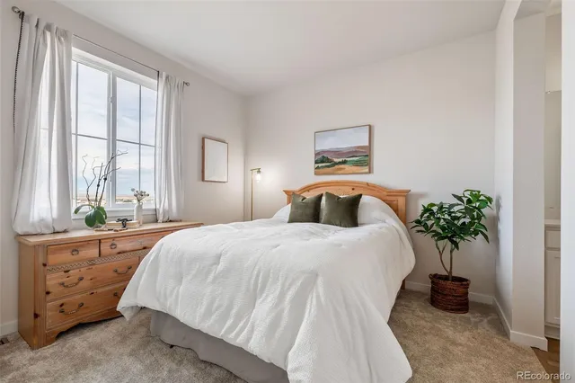 a bathroom with a double vanity sink and mirror