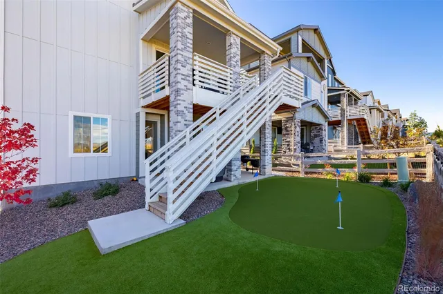 a view of a yard with an outdoor space