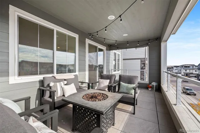 a view of kitchen with cabinets table and chairs