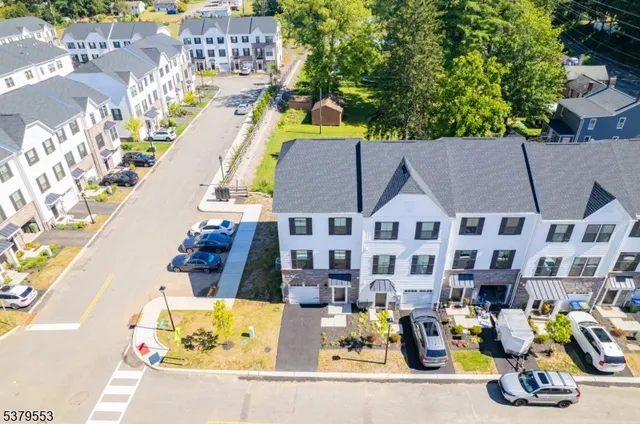 an aerial view of a house with a garden