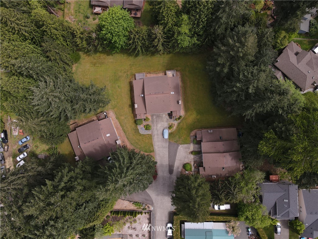 17213 Gravenstein Road Bothell, WA 98012 - Photo 5 of 14 an aerial view of a house with a lake view