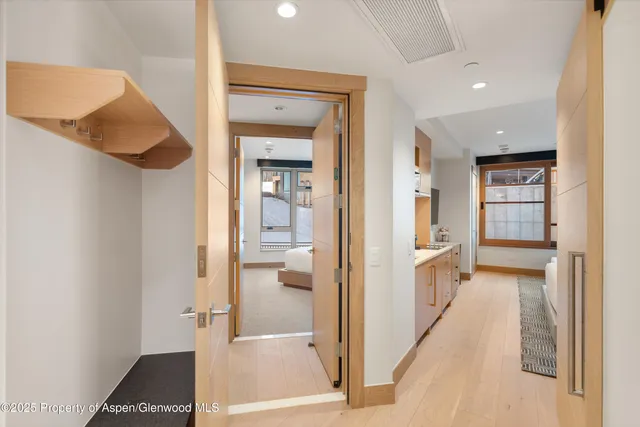 a view of a bathroom with a tub and shower