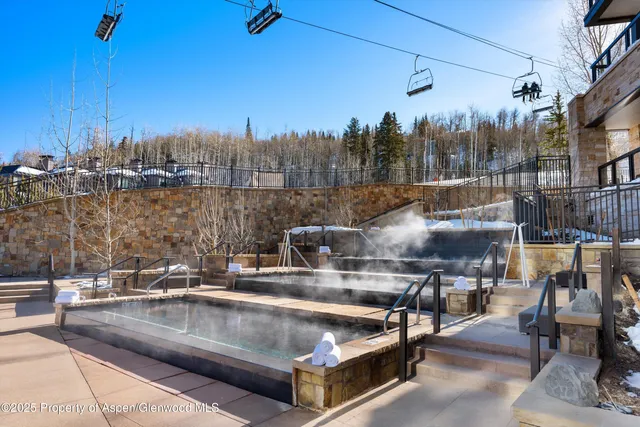 a view of a chairs and tables in patio