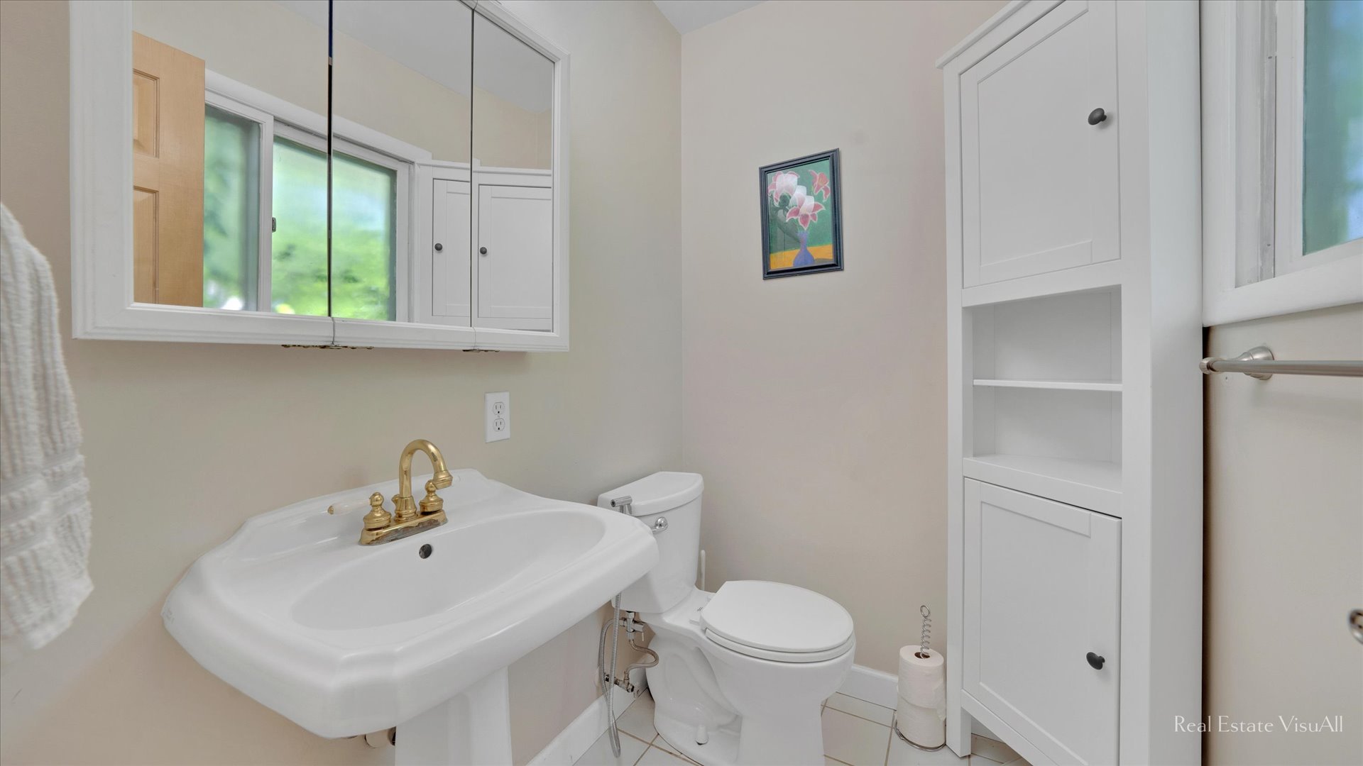 1385 Cooper Road Hoffman Estates, IL 60169 - Photo 17 of 26 a bathroom with a sink a toilet and mirror