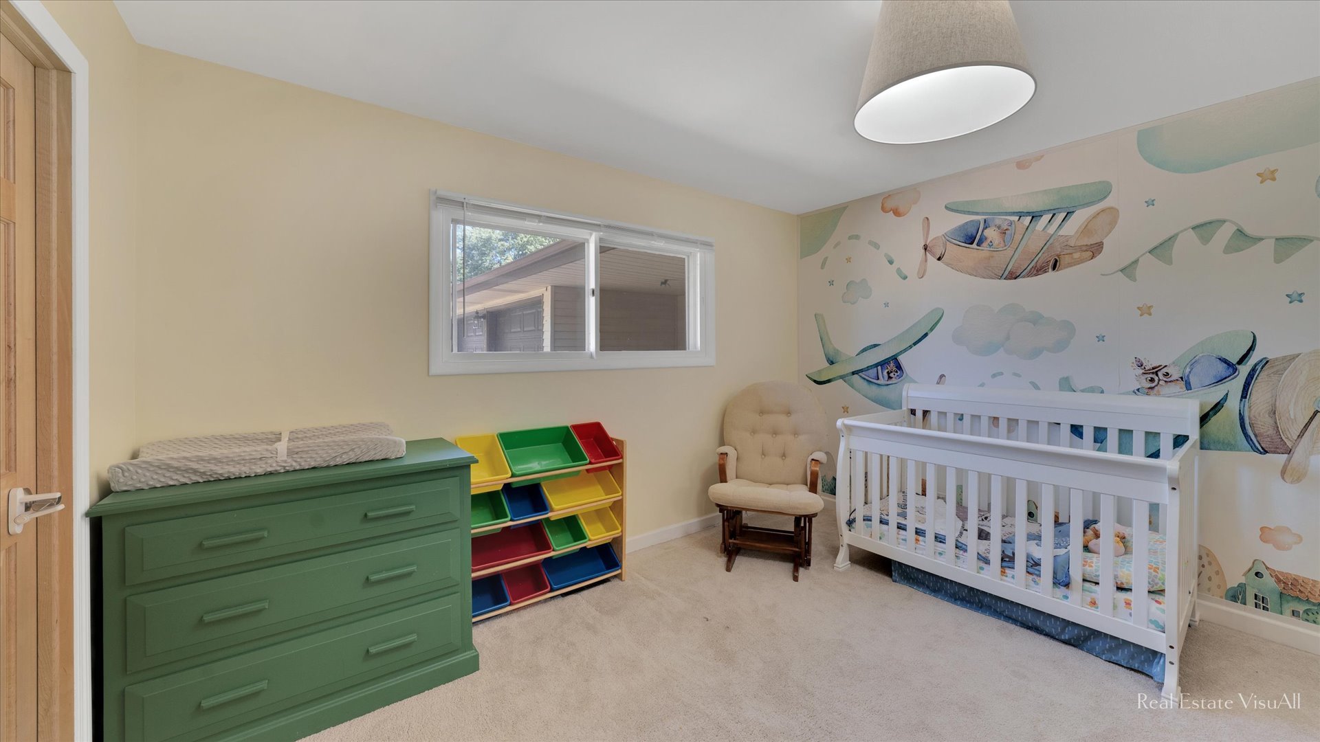 1385 Cooper Road Hoffman Estates, IL 60169 - Photo 18 of 26 a bedroom with furniture and a baby crib
