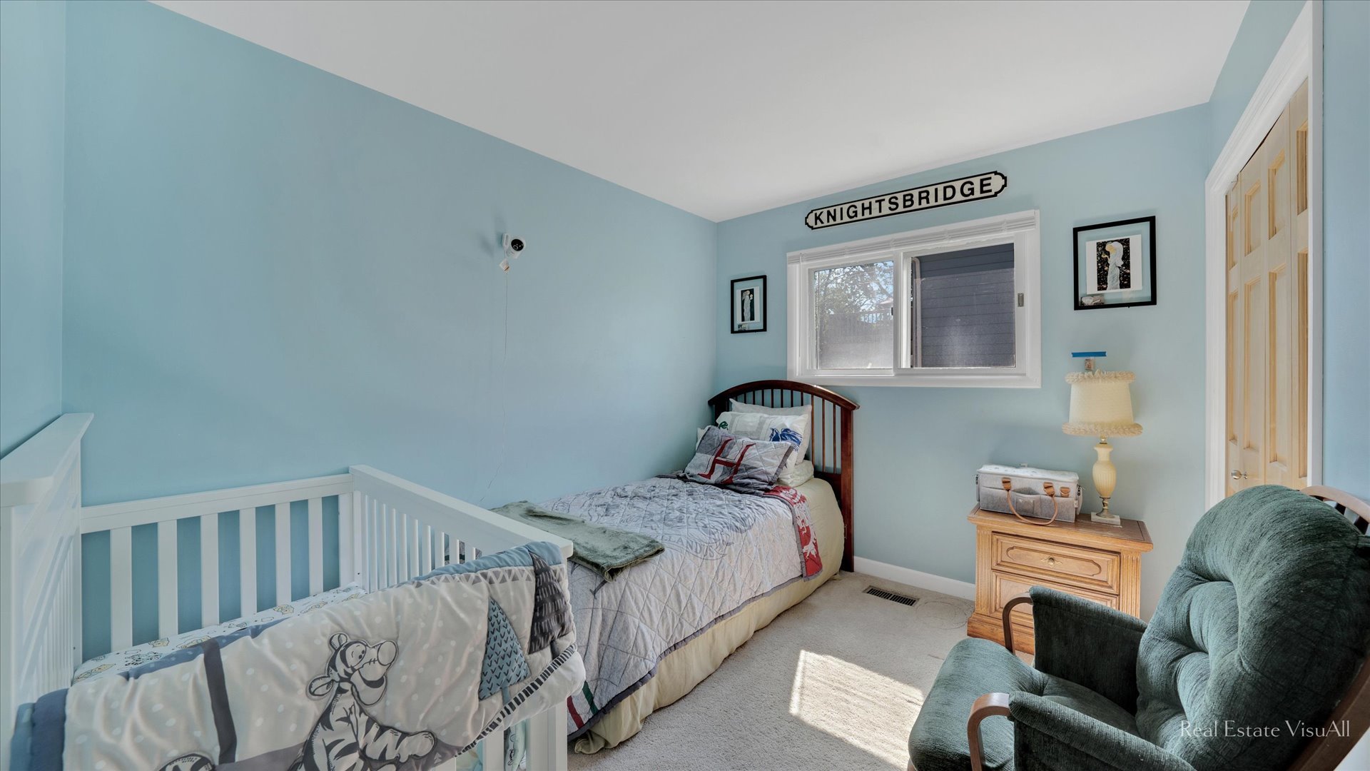 1385 Cooper Road Hoffman Estates, IL 60169 - Photo 20 of 26 a bedroom with furniture and a window