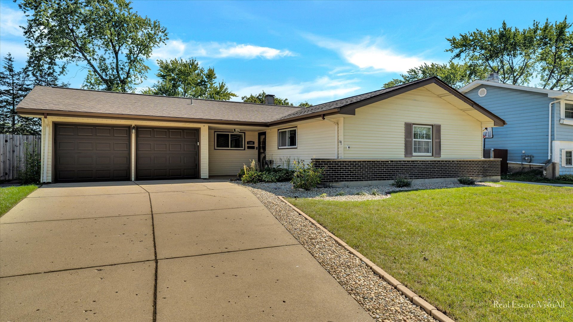 1385 Cooper Road Hoffman Estates, IL 60169 - Photo 2 of 26 a house view with a outdoor space