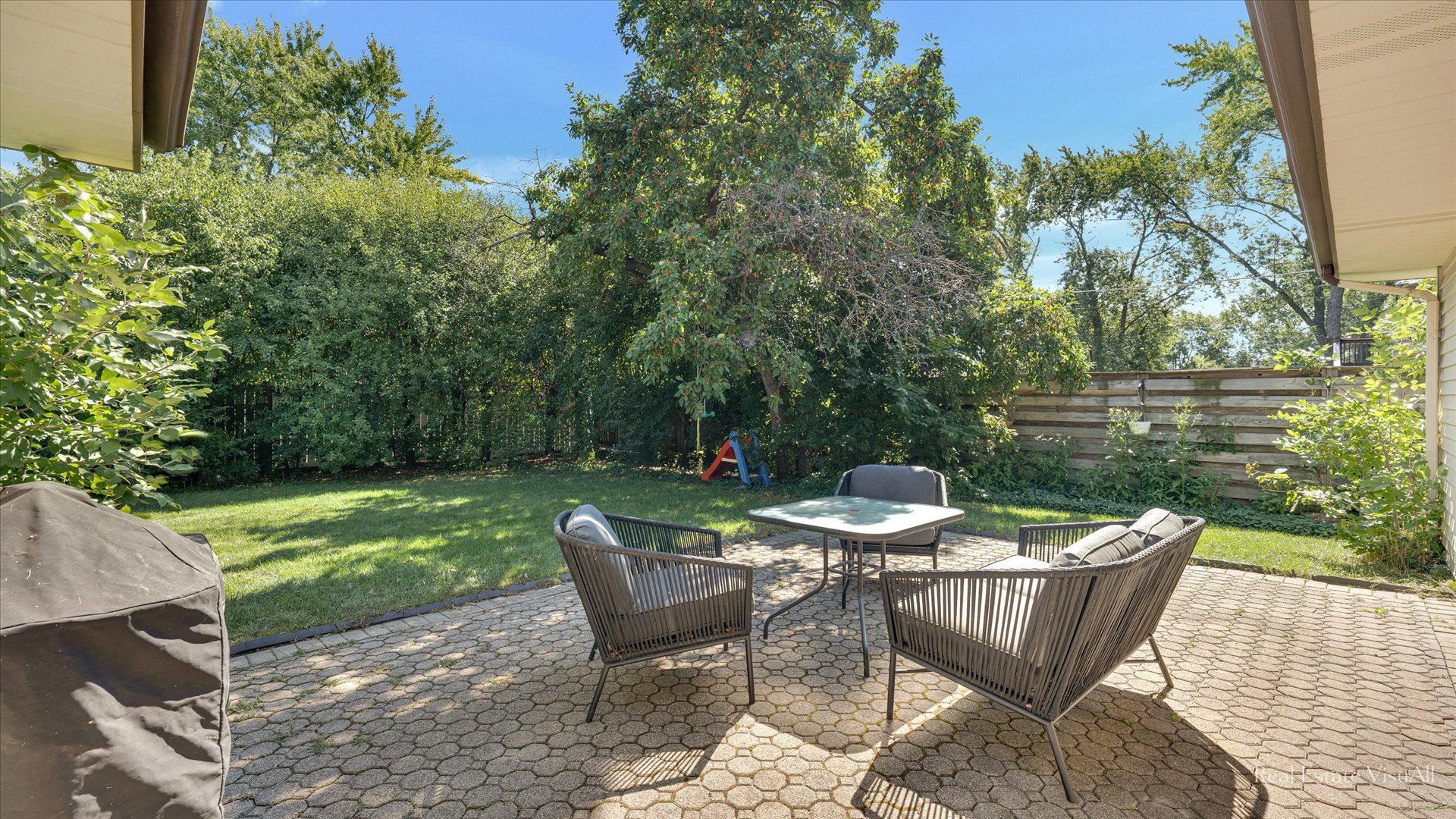 1385 Cooper Road Hoffman Estates, IL 60169 - Photo 22 of 26 a view of a chairs and table in the patio