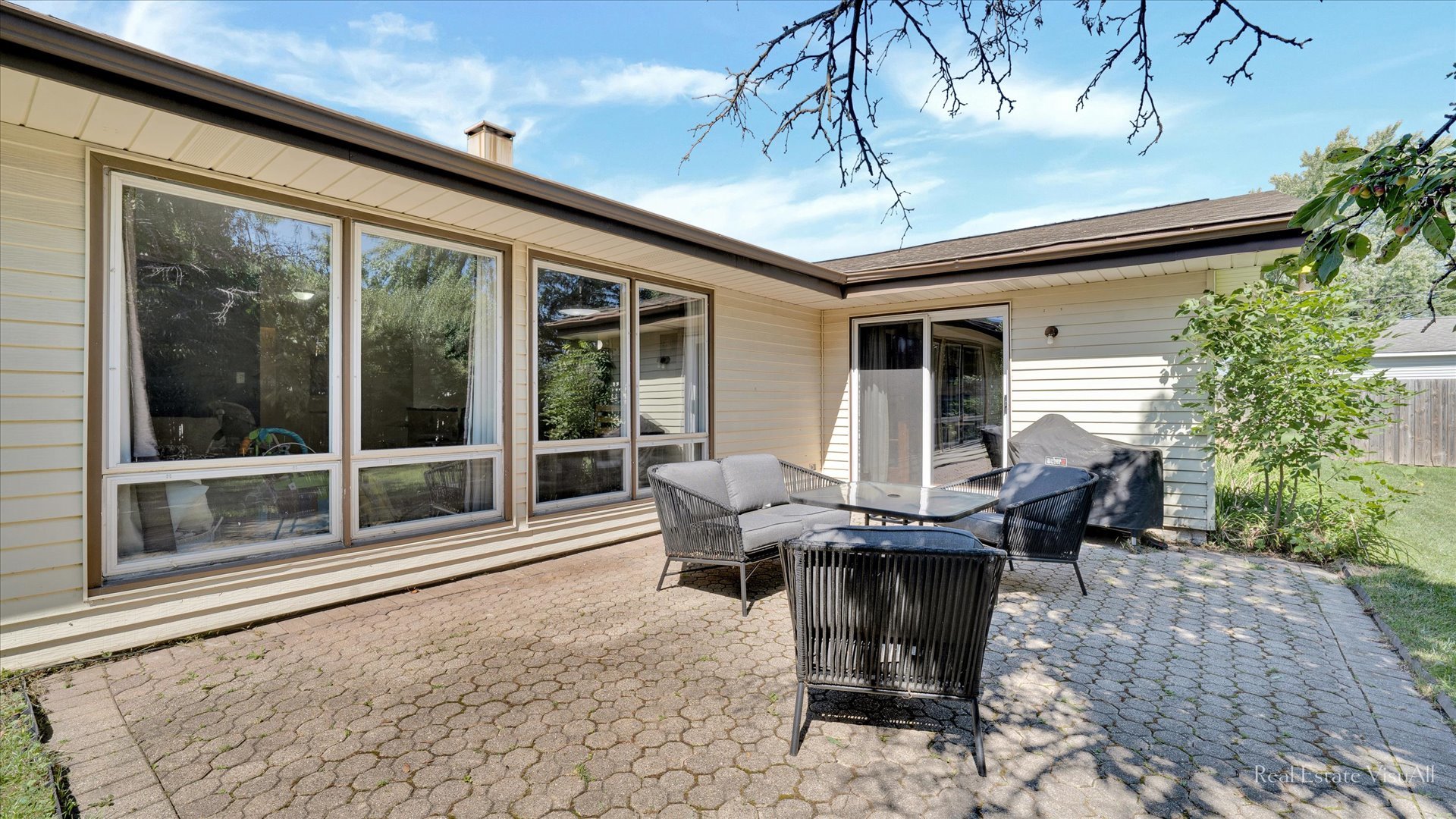 1385 Cooper Road Hoffman Estates, IL 60169 - Photo 23 of 26 a roof deck with table and chairs and potted plants