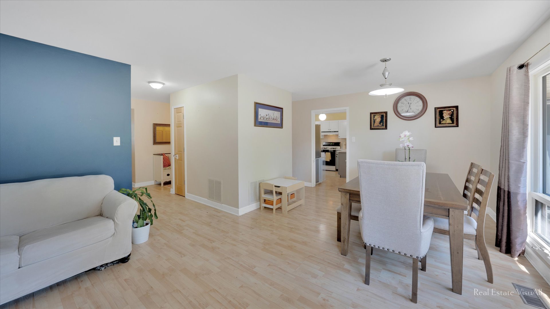 1385 Cooper Road Hoffman Estates, IL 60169 - Photo 5 of 26 a living room with furniture and a wooden floor