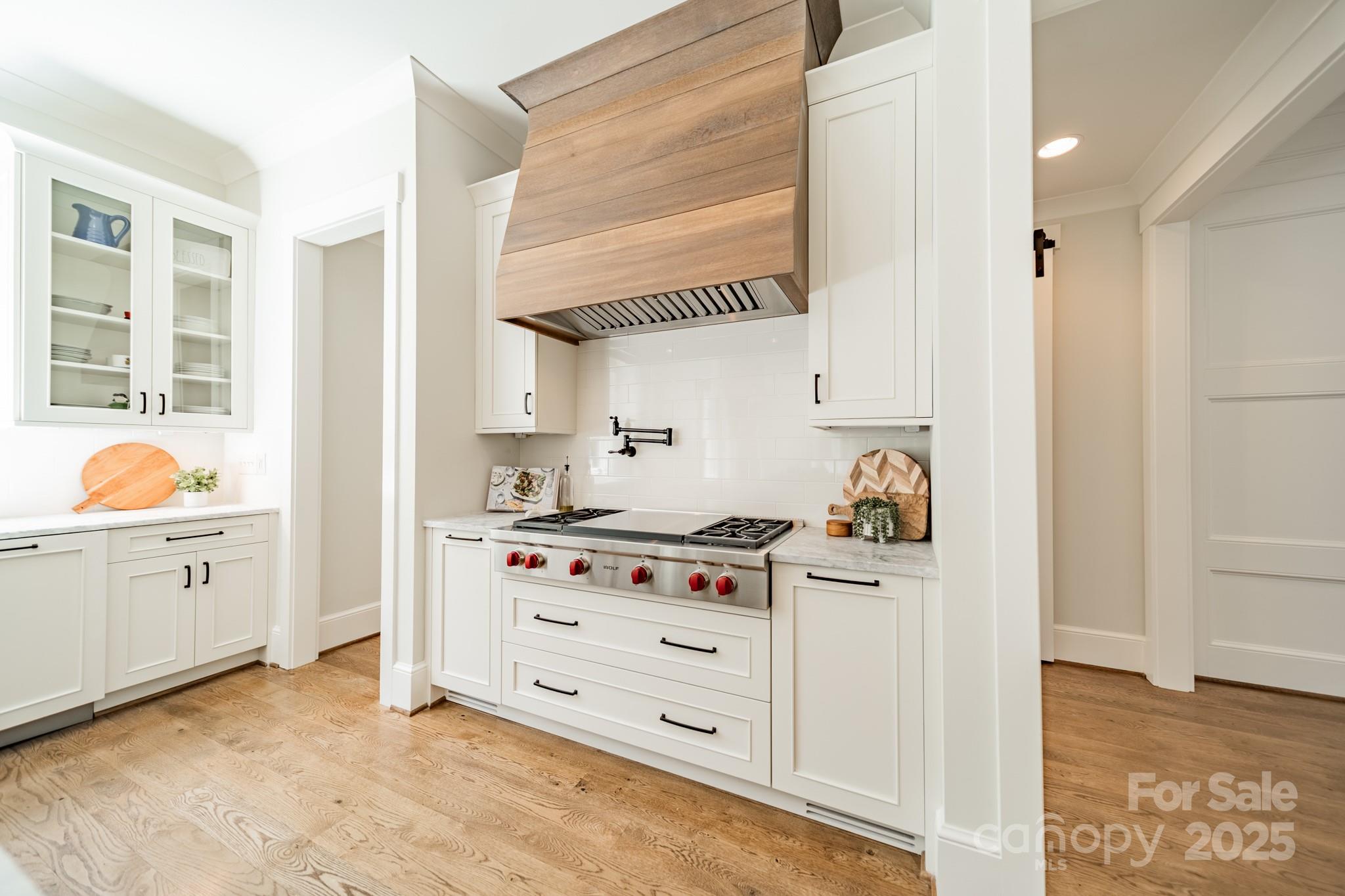 431 Bramble Way Fort Mill, SC 29708 - Photo 12 of 48 a kitchen with cabinets appliances and a window