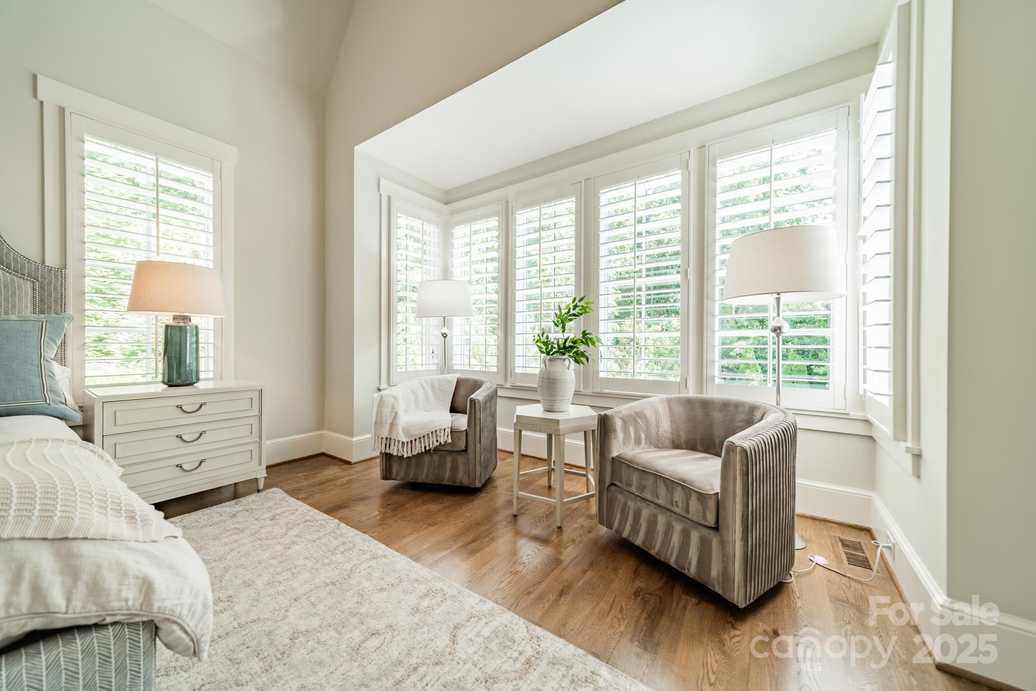 431 Bramble Way Fort Mill, SC 29708 - Photo 17 of 48 a bedroom with furniture and large windows