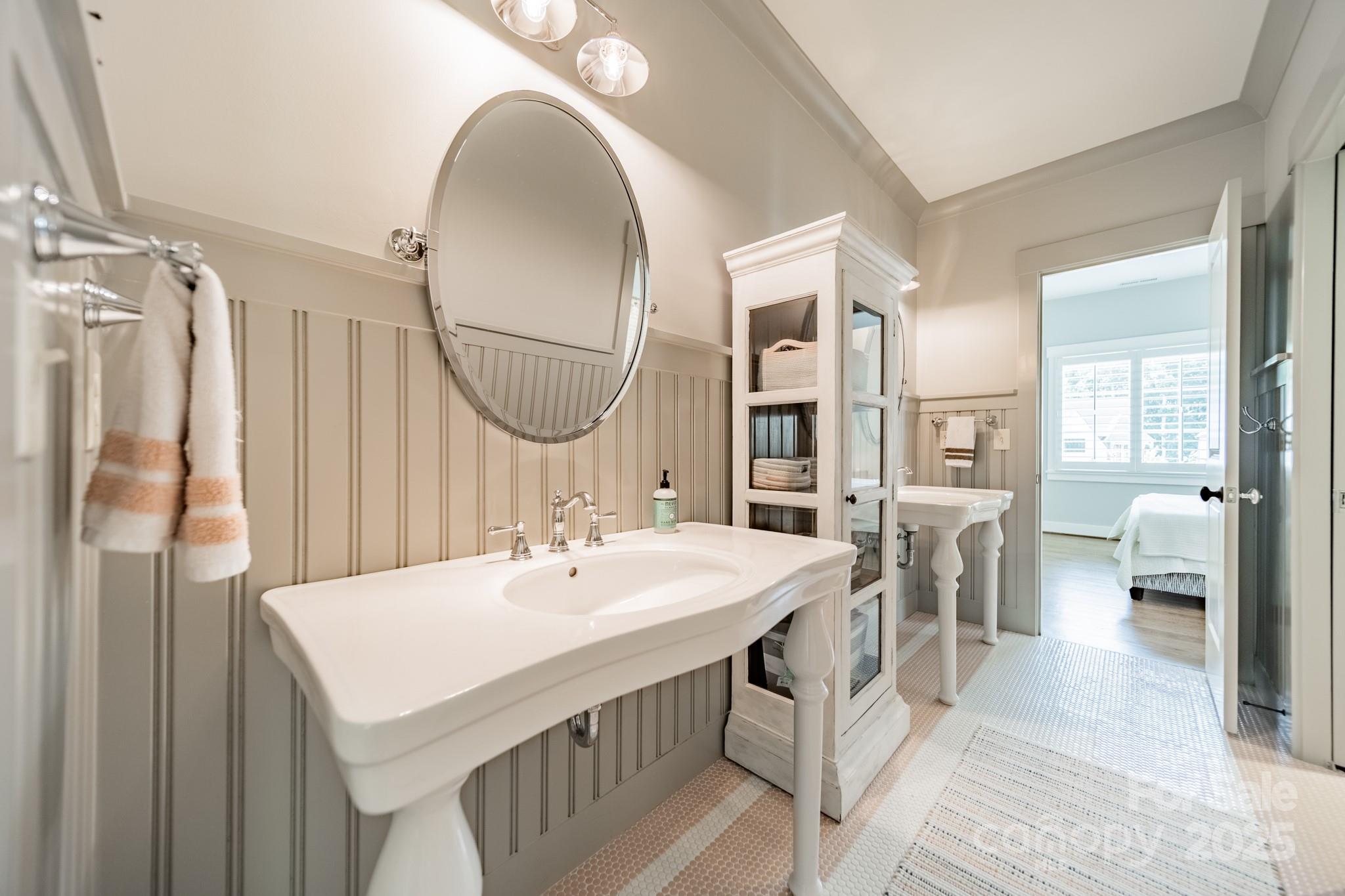 431 Bramble Way Fort Mill, SC 29708 - Photo 34 of 48 a bathroom with a sink and a mirror