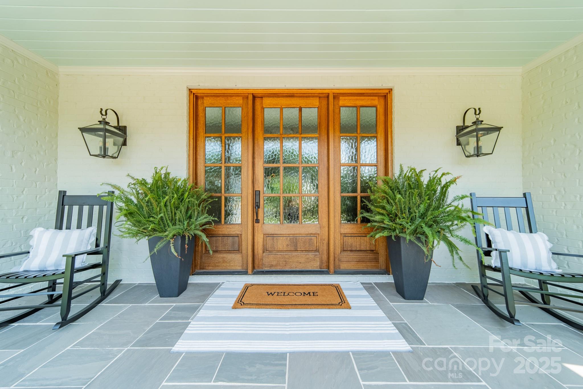 431 Bramble Way Fort Mill, SC 29708 - Photo 4 of 48 a view of an entryway with a potted plant