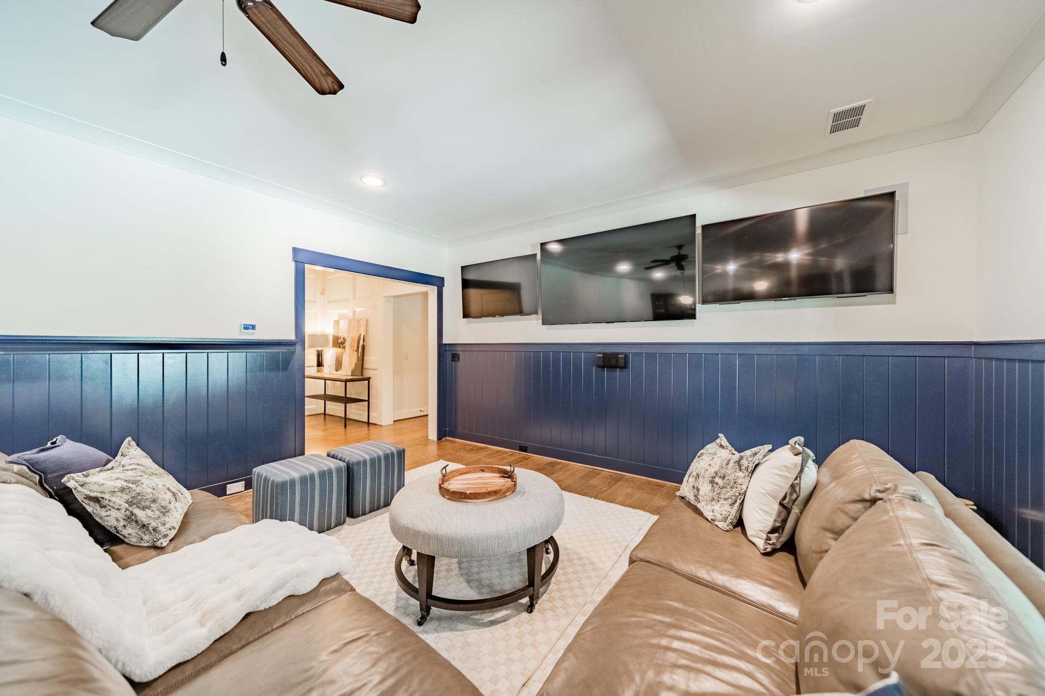 431 Bramble Way Fort Mill, SC 29708 - Photo 41 of 48 a living room with furniture and a wooden floor