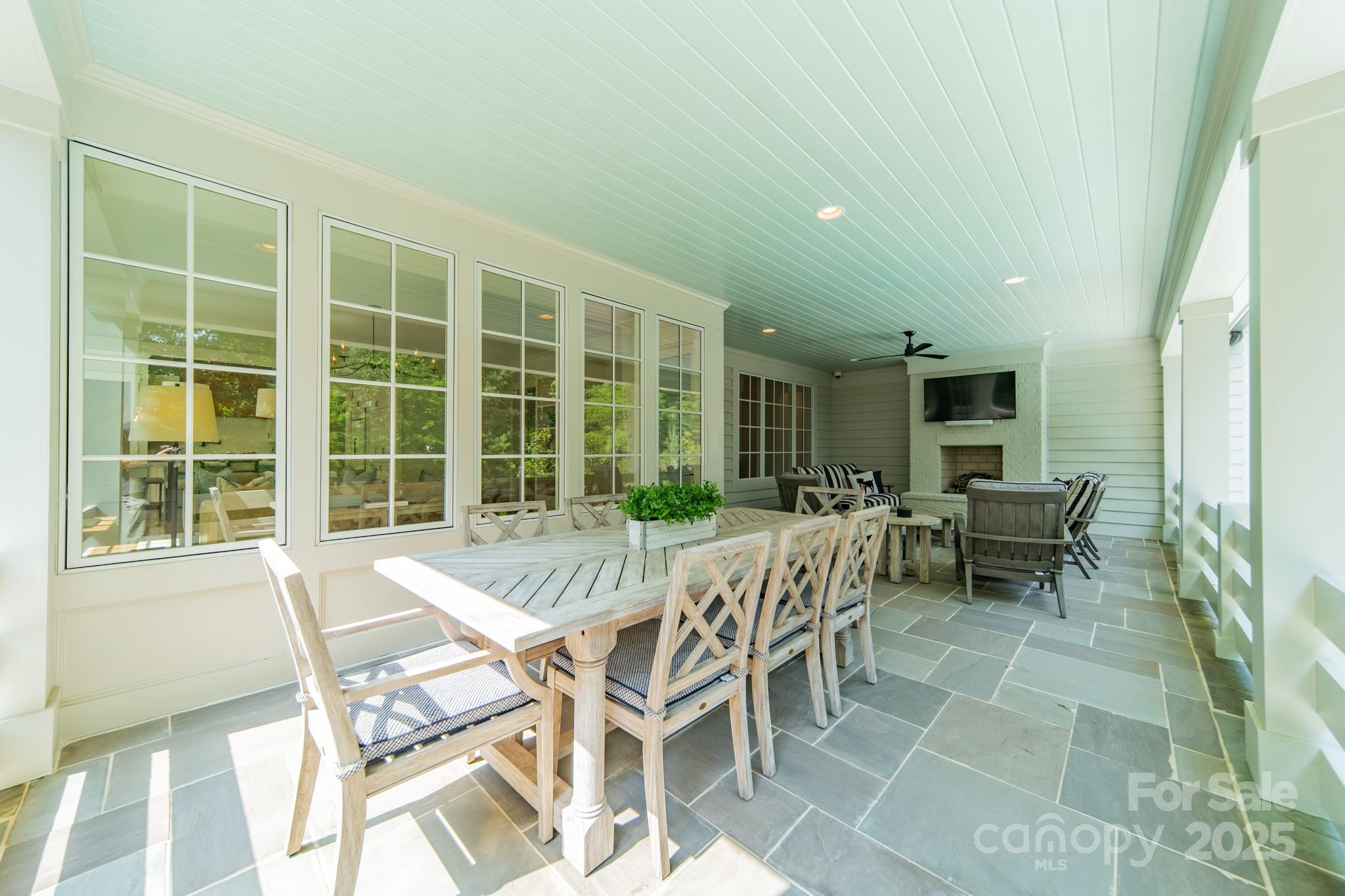 431 Bramble Way Fort Mill, SC 29708 - Photo 48 of 48 a view of a dining room with furniture and floor to ceiling window