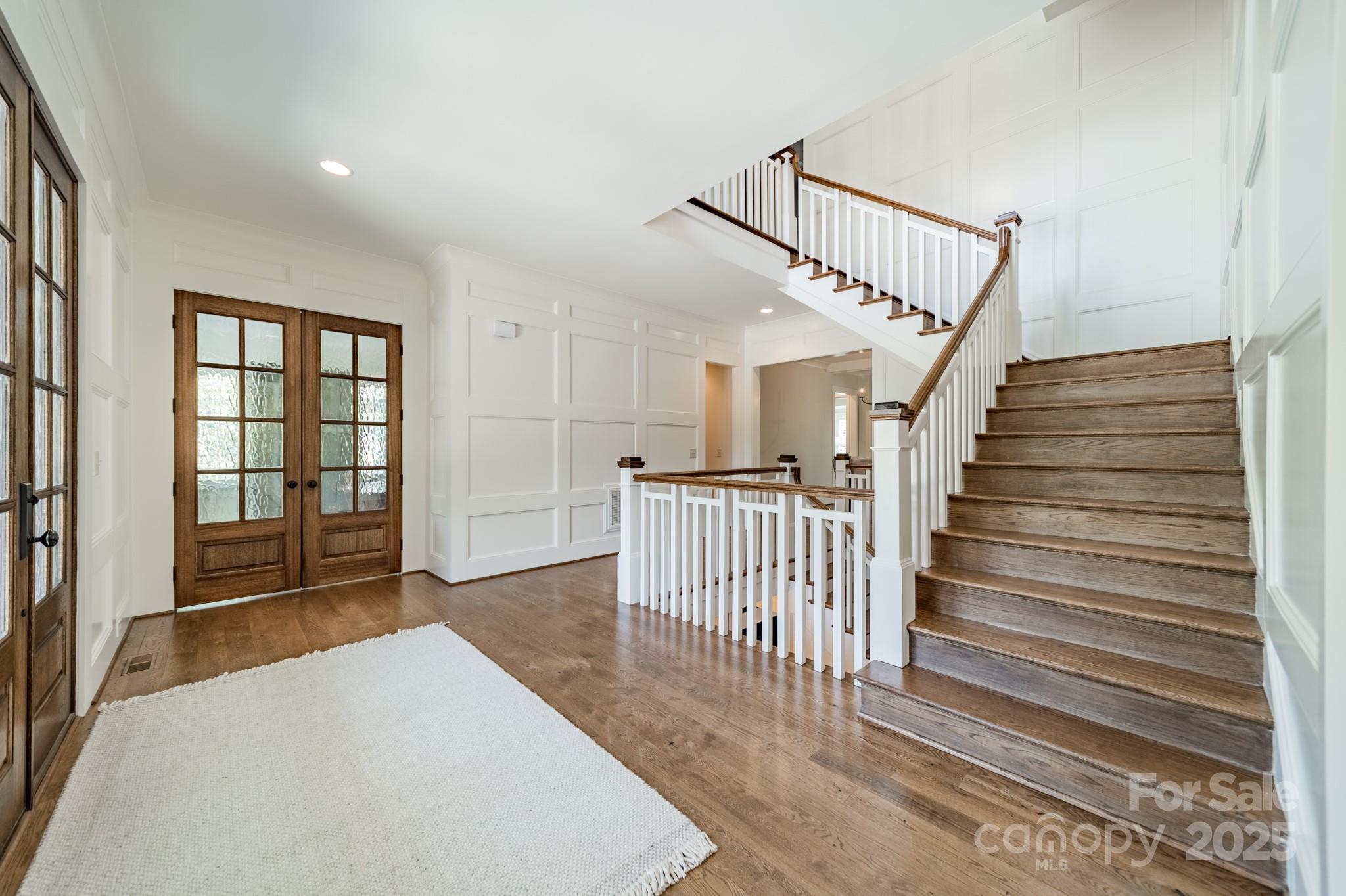 431 Bramble Way Fort Mill, SC 29708 - Photo 5 of 48 a view of entryway and hall with wooden floor