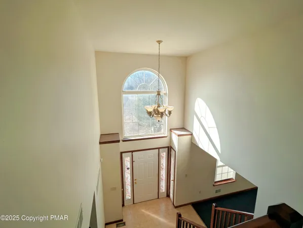 a view of a livingroom with furniture and window