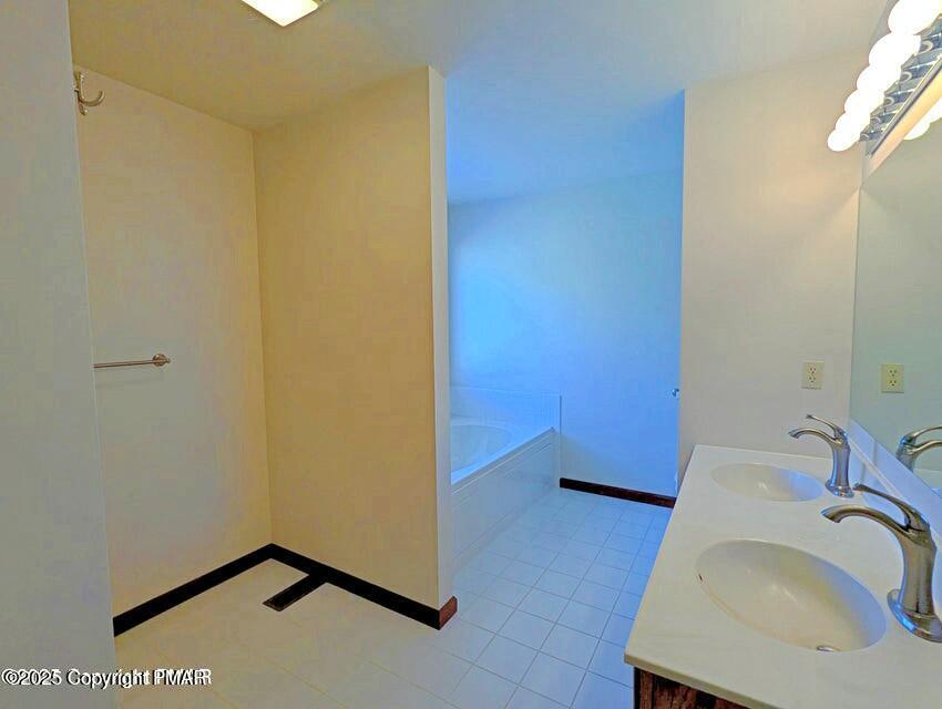 1603 Rachel Road Stroudsburg, PA 18360 - Photo 16 of 33 a bathroom with a sink and a mirror