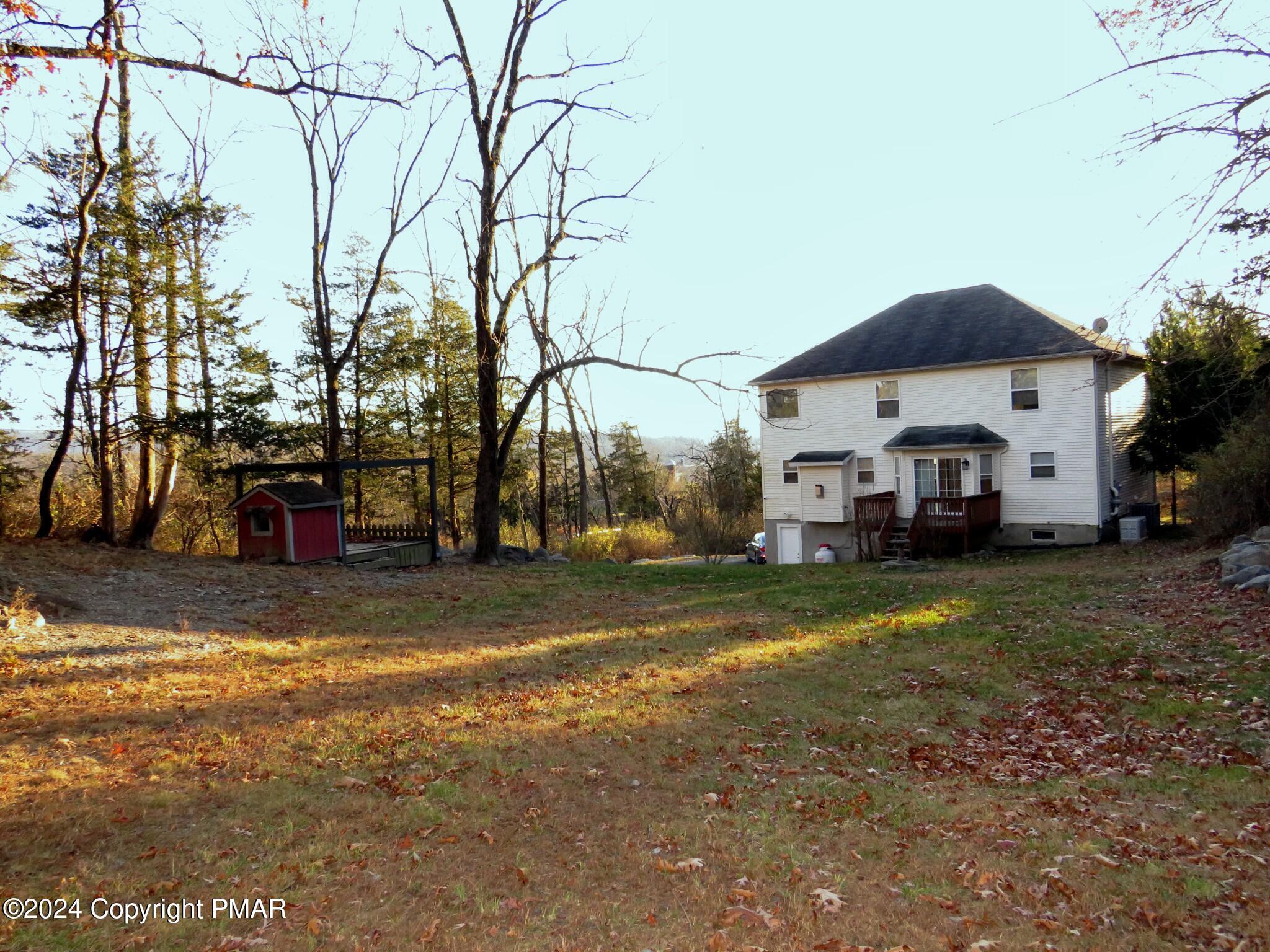 1603 Rachel Road Stroudsburg, PA 18360 - Photo 29 of 33 a view of a house with a yard