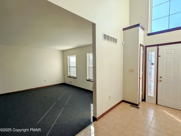 a view of an empty room with window