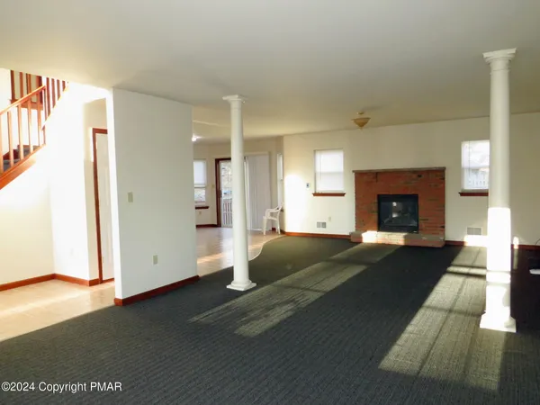 a living room with a fireplace