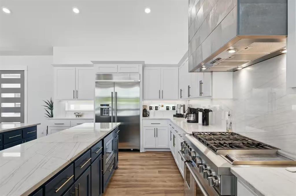 2752 Briarwood Harbor Road Malakoff, TX 75148 - Photo 15 of 37 a kitchen with a stove a sink dishwasher and a refrigerator