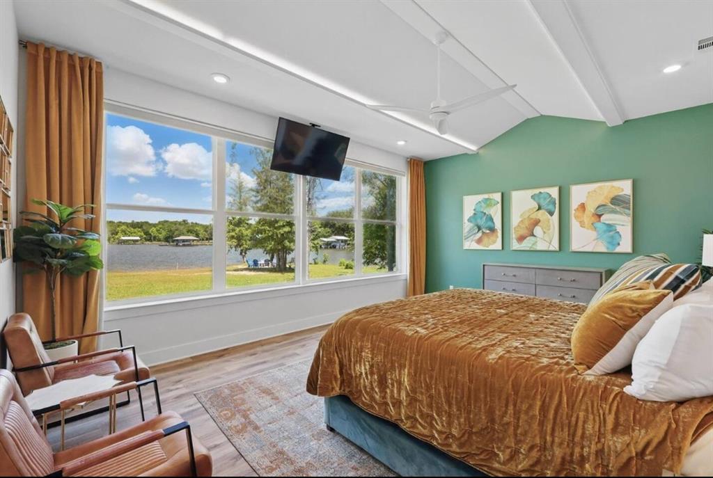 2752 Briarwood Harbor Road Malakoff, TX 75148 - Photo 17 of 37 a bed sitting in a spacious bedroom next to a window