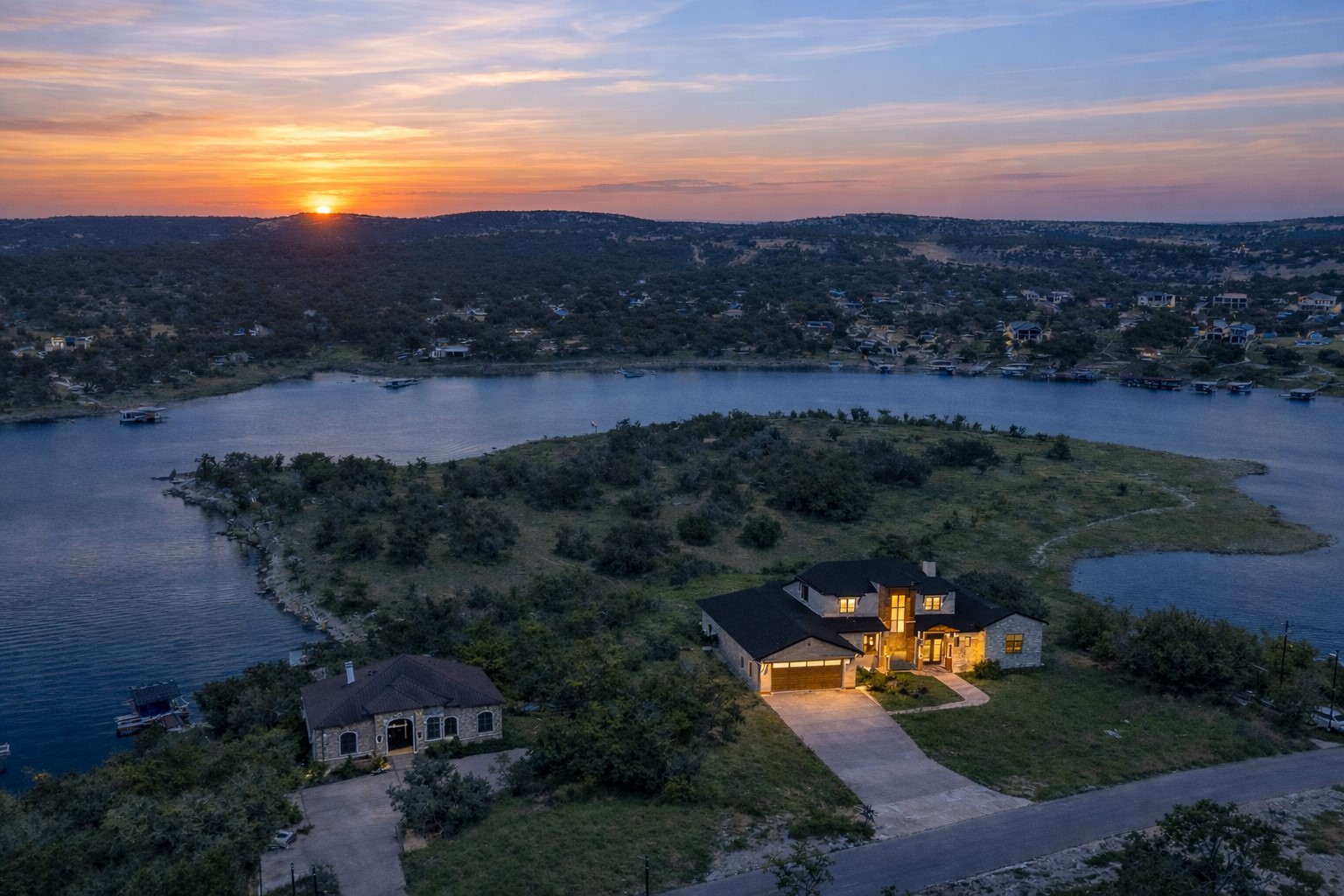 19813 Lakehurst Loop Spicewood, TX 78669 - Photo 1 of 22 an aerial view of a house with mountain view in back