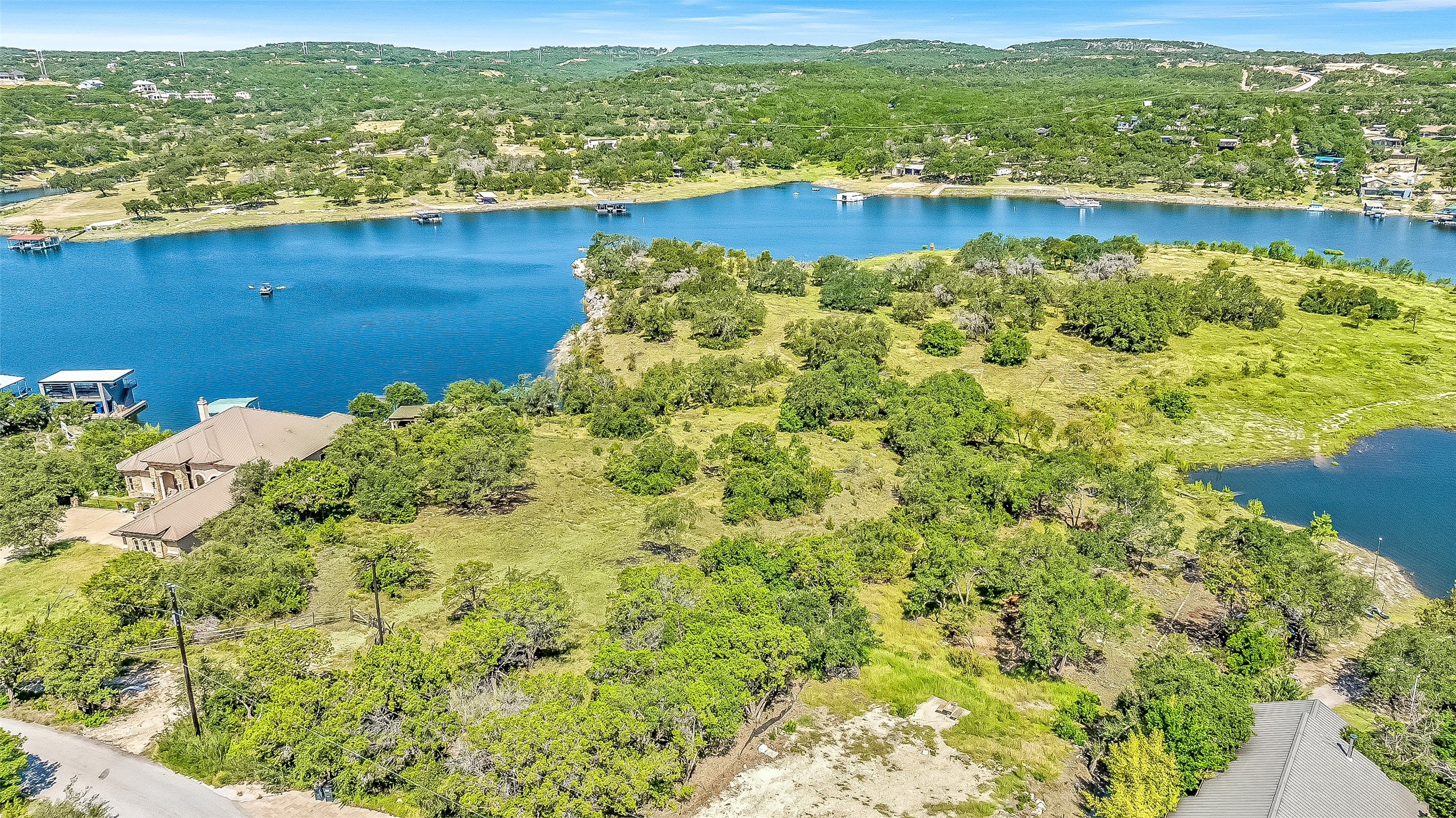 19813 Lakehurst Loop Spicewood, TX 78669 - Photo 17 of 22 a view of a lake with an ocean