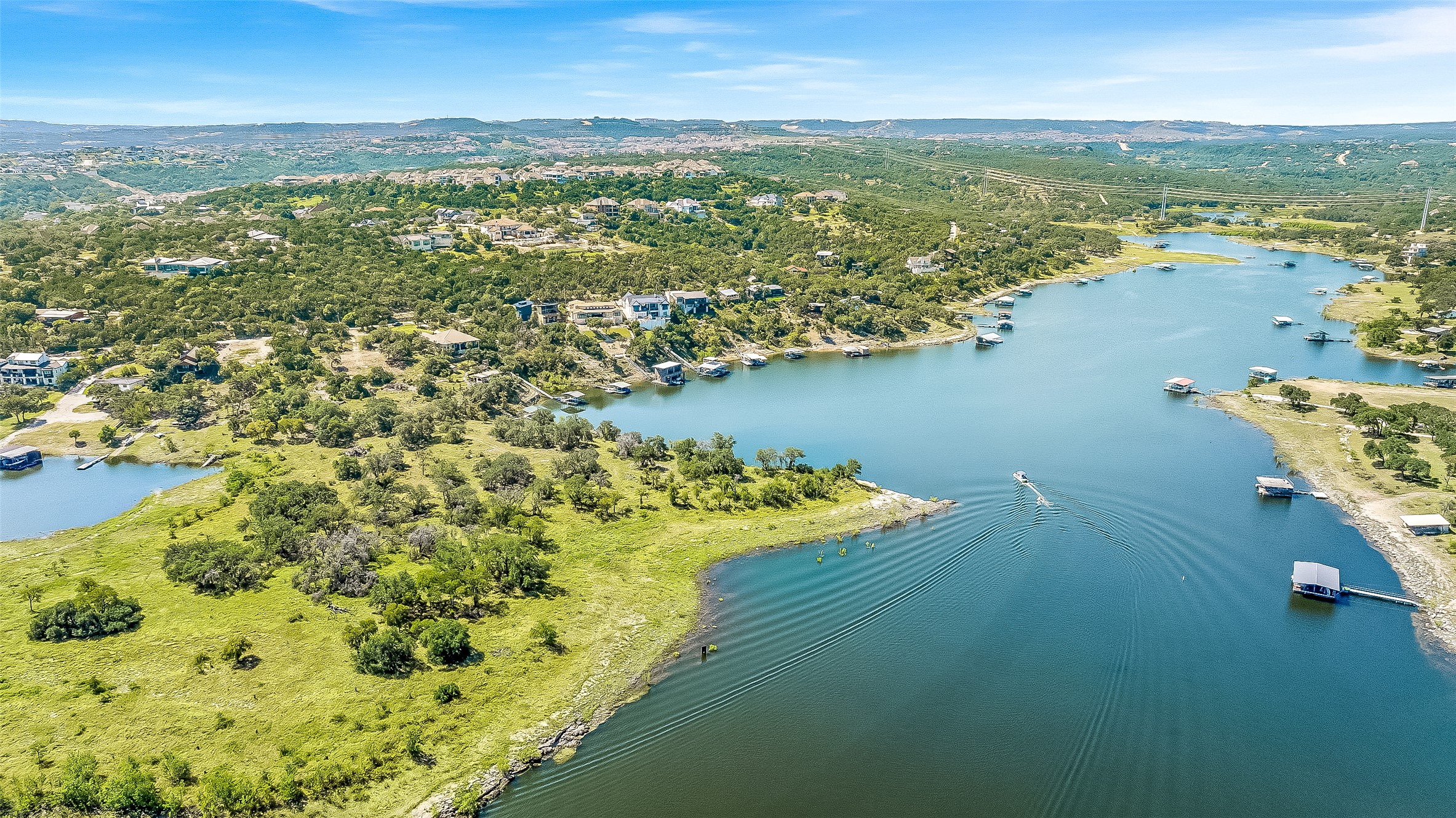 19813 Lakehurst Loop Spicewood, TX 78669 - Photo 7 of 22 a view of a city with ocean view