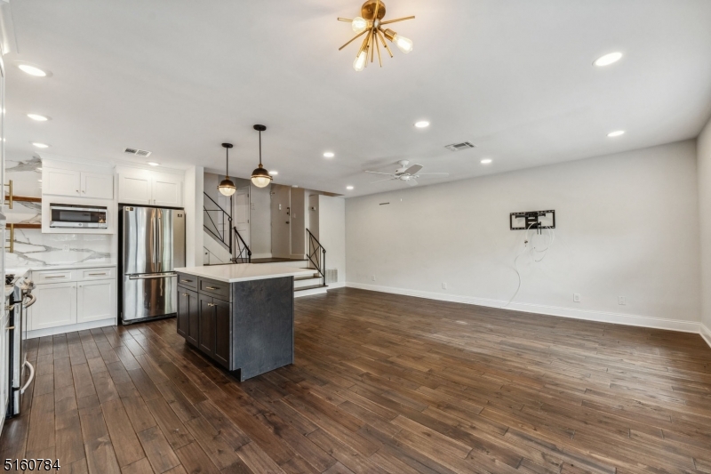 31 Upper Mountain Avenue, Unit 4 Montclair, NJ 07042 - Photo 2 of 22 a view of kitchen with sink and wooden floor