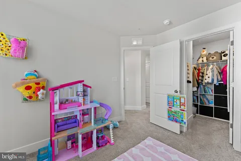 a bedroom with furniture and a couch