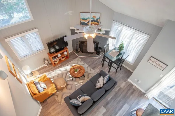 a living room with furniture and a window