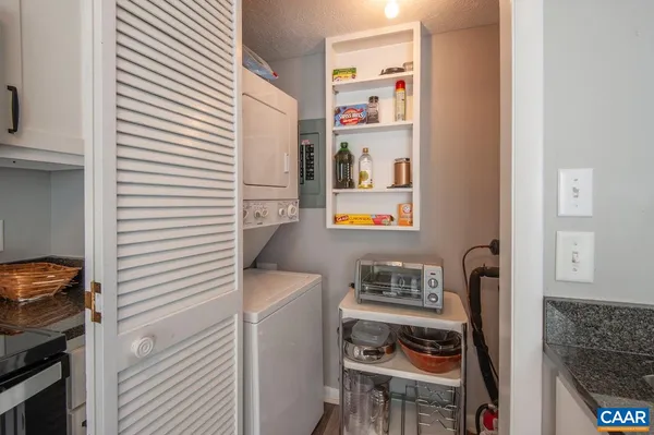 a bedroom with a bed and television